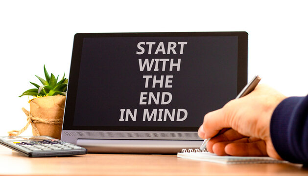 Start with the end in mind symbol. Concept words Start with the end in mind on beautiful black tablet's screen. Beautiful white background. Business start with the end in mind concept. Copy space.