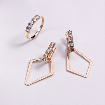 Elegant Rose Gold Jewelry Set Featuring Ring and Dangle Earrings with Sparkling Blue Crystals for Glamorous Occasions