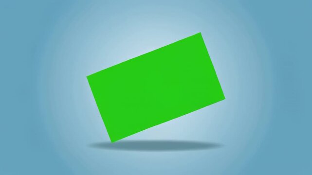 Green screen rectangle rotating with soft spotlight and shadow on blue background seamless loop