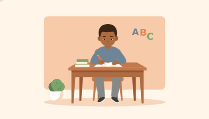 Fototapeta premium Young boy of African descent sitting at a wooden desk writing in his notebook during an elementary school lesson.