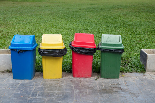 Colorful trash cans for sorting garbage. For plastic, glass, paper and others waste. Waste containers for garbage segregation.