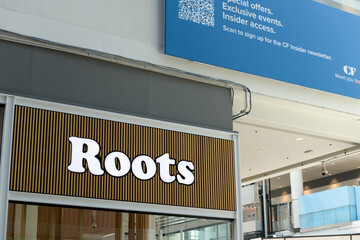 Fototapeta premium shopping mall interior with sign of Roots, a clothing store, located here at the CF Toronto Eaton Centre, 220 Yonge St