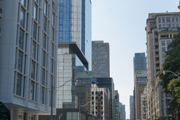 Fototapeta premium view from northeast corner of Scollard Street and Bay Street in Yorkville - looking south - down Bay Street, and heading toward the heart of downtown Toronto