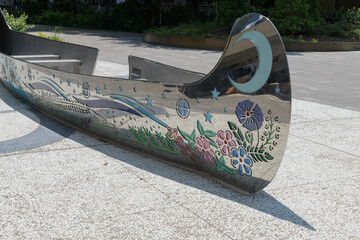 Fototapeta premium detail of The Spirit Canoe (resembling a traditional Métis Voyageur canoe) created by Tannis Nielsen at the Spirit Garden, City Hall, Toronto 