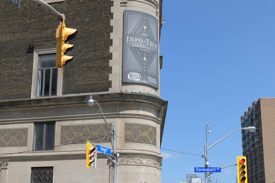 wall mounted banner sign of Info-Tech Research Group located at 888 Yonge St, also known as The Masonic Temple / The Concert Hall, Toronto