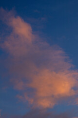 Fototapeta premium Pink Sunset Clouds Against Blue Sky