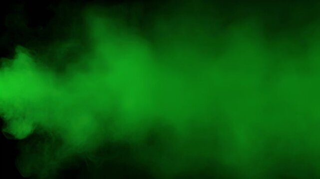 Green Smoke Eruption With Cinematic Motion Against Black Background For Special Effects