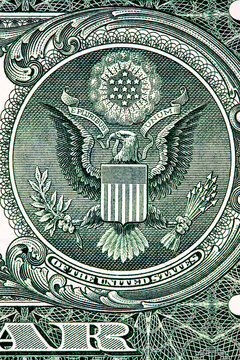 1 US dollar bill, featuring the bald eagle, shield, olive branch and arrows. currency of the United States. World money.