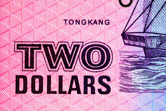 2 Singapore dollar banknote with the image of the denomination of two dollars. Singapore currency. World money.