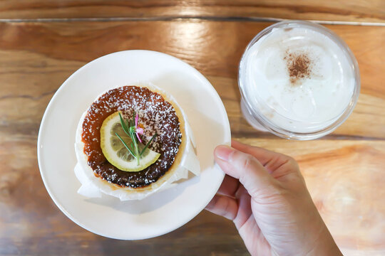 cheesecake or basque cheesecake , piece of cake or lemon cheesecake oe cheesecake with lemon topping
