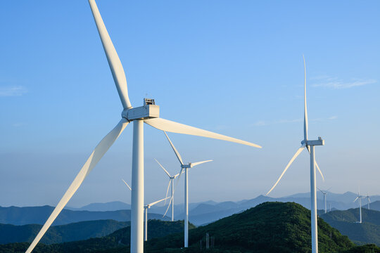 Wind Turbines on Forested Mountain Ridge
