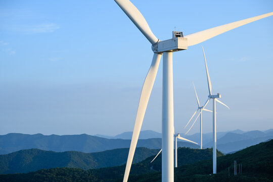Wind Turbines on Forested Mountain Ridge