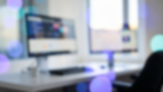 Blurred Modern AI Workplace Desk Setup for Corporate Website Banner