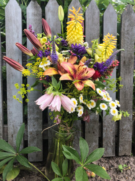 A vibrant rustic flower bouquet arrangement