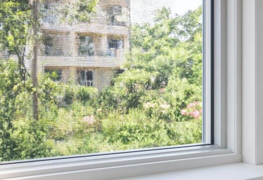 Close-up of mosquito net window screen mesh providing insect protection, durable wire texture, home ventilation, bug barrier, modern construction material, clean background design.