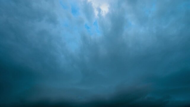 Lightning Bolts Striking Across Dark Blue Storm Clouds Time Lapse, Multiple Lightning Strikes Flashing Through Cloudy Night Sky, Dramatic Thunderstorm Time-Lapse Footage