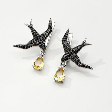 Elegant Black Bird-Shaped Earrings with Yellow Gemstone Accents Perfect for Any Stylish Occasion