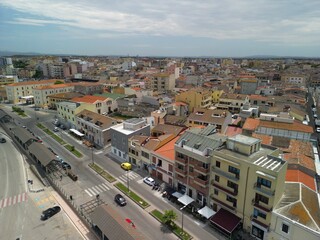 Sardynia - Włochy Miasto portowe Porto Torres na północy Sardyni. Zdjęcie wykonane z powietrza , dronem. Port, Statki, morze, ulica i budynki © Konrad