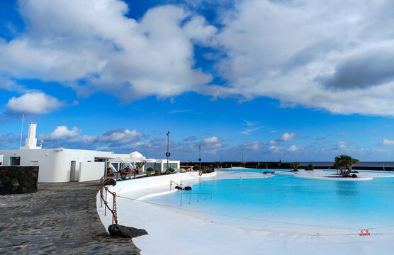 Arrecife, Lanzarote, Spain - December 17, 2025: General view of the saltwater pool at Islote de Fermina, an iconic seaside complex designed by Cesar Manrique in the capital of Lanzarote