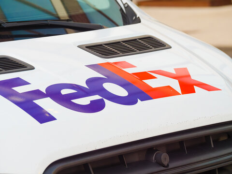 FedEx logo on delivery truck, logistics shipping company courier vehicle with sign, 18 December 2025, Poland
