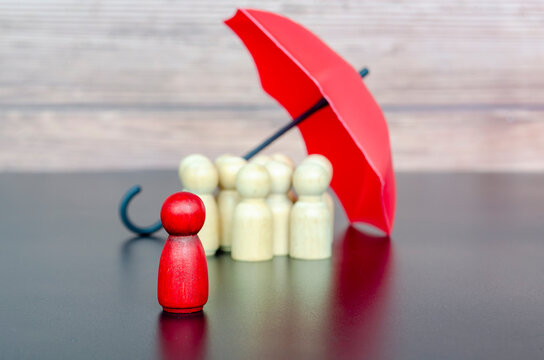 Leader figure standing under umbrella among followers representing guidance, protection, and leadership responsibility.