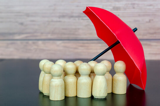 Large umbrella sheltering large followers symbolizing strong leadership, safety, and organizational protection.