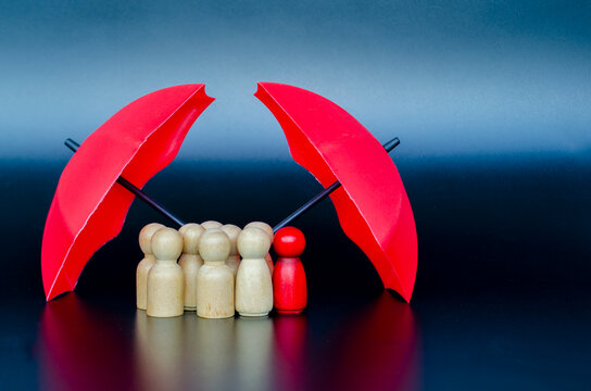 Large umbrella sheltering a group of followers representing protective leadership, security, and organizational trust.