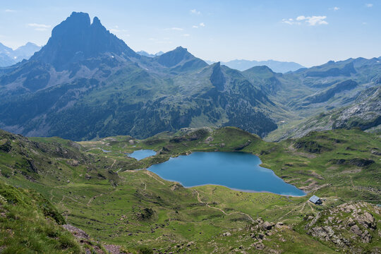 Refuge d&rsquo;Ayous at lake Gentau and the famous mountasin Petit Pic du Midi d'Ossau. Hautes-Pyr&eacute;n&eacute;es.