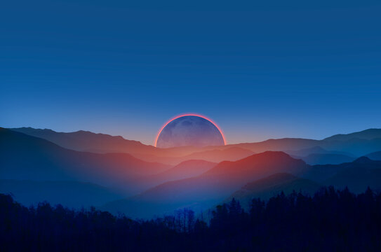 Beautiful landscape with cascade blue mountains at the morning with solar eclipse - View of wilderness mountains during foggy weather