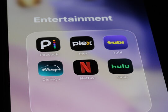 Shanghai,China-July 30th 2026: streaming apps on phone screen. Peacock, Plex, Tubi, Disney+, Netflix, Hulu.