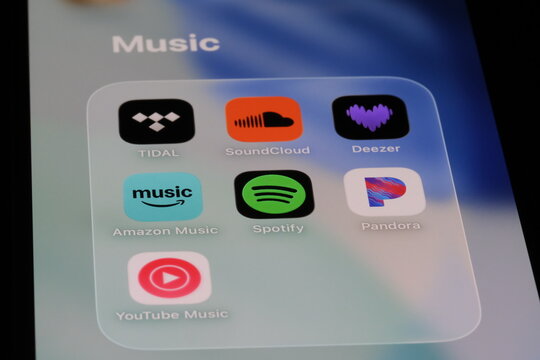 Shanghai,China-July 30th 2026: phone screen with various music streaming apps, Spotify, YouTube Music, Amazon Music, TIDAL, SoundCloud, Deezer, Pandora.