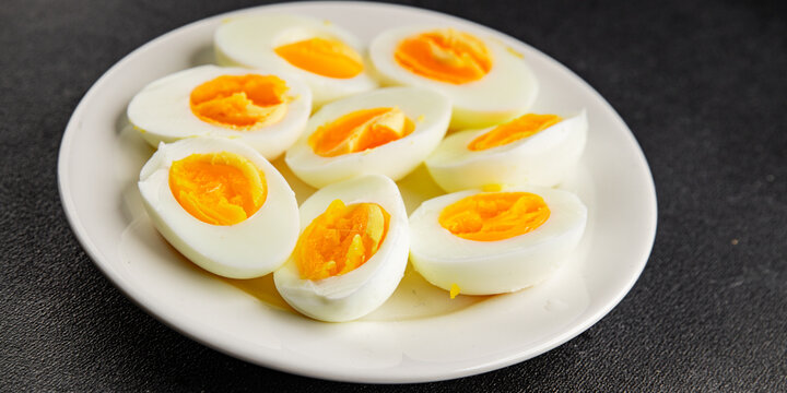Boiled eggs yolk and egg white tasty snack healthy fresh delicious gourmet food background on the table  rustic food top view copy space keto and paleo diets