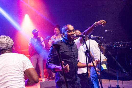 African american man singing a live music performance