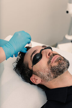 Dermatologist applying a non-invasive facial skincare treatment