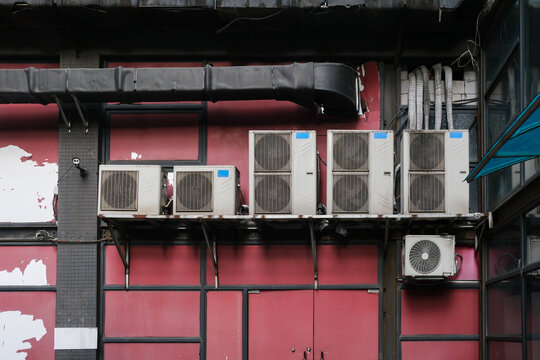 Exterior wall with multiple air conditioning units