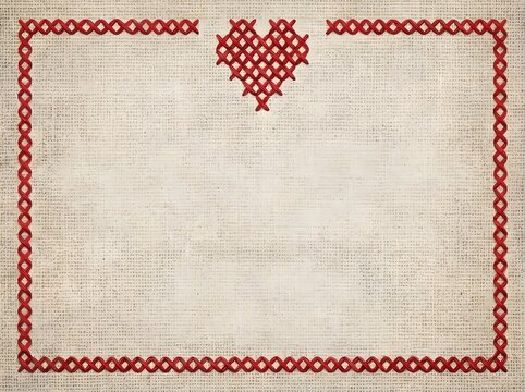 Rustic textured background with red cross stitch heart and border pattern.
