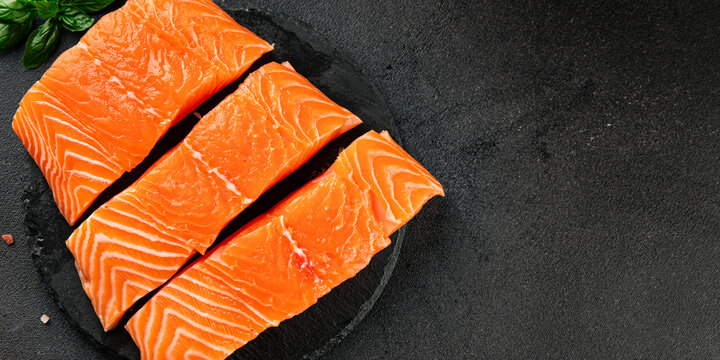 Raw salmon red fish fillet fresh seafood tasty snack &nbsp;pescetarian diet delicious gourmet food background on the table rustic food top view copy space keto and paleo diets vegetarian food