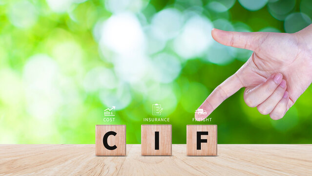 CIF Cost Insurance Freight incoterms concept. businessman touching letter on wooden cube for global trade shipping and logistics business. not ai