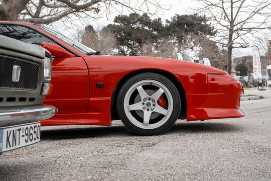 corfu, corfu, Greece. February 16, 2025: Red Nissan 200SX S13 parked outdoors