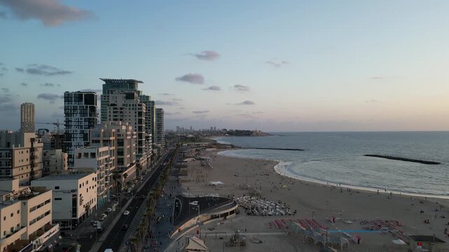 tel aviv coastline beach promenade and jaffa view at sunset aerial drone shot