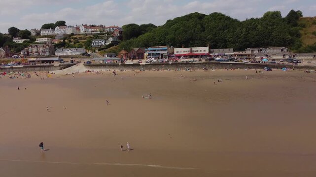 Drone 50FPS. Filey, South yorkshire. English seaside town. Summer holidays. 