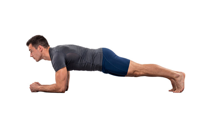 Athletic man performing forearm plank exercise, fit male doing core strength training, muscular guy in sportswear practicing yoga plank pose isolated PNG with Transparent Background