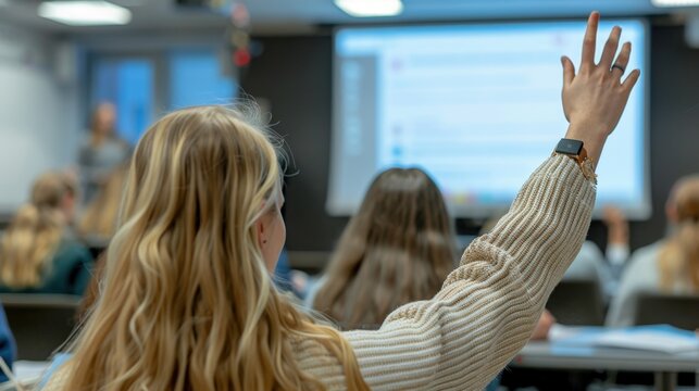 Woman Raising Hand in Conference Room