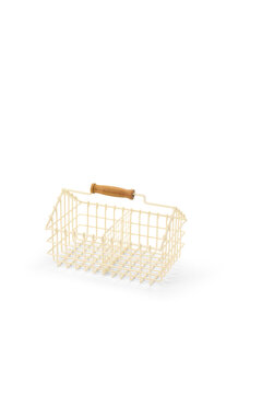 A small light yellow wire metal storage basket with a wooden handle for organizing home and kitchen items