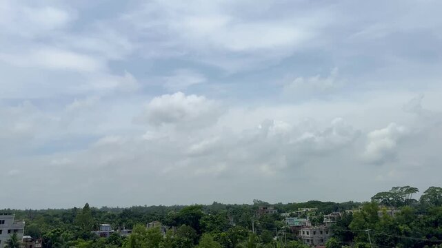 Dramatic Blue Sky with Fluffy White Clouds in Bright Sunlight