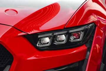 Red Sports Car Front Detail with Modern LED Headlight and Aggressive Grille, High Performance Automobile Design, Luxury Supercar Exterior Close Up, Automotive Technology Concept © Design