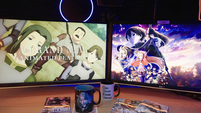 POV reading Japanese manga comic Sword Art Online with PC monitors with neon lights in background