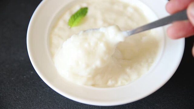 Sweet rice porridge healthy breakfast, vanilla dessert food preparation tasty snack fresh and delicious gourmet food background on the table rustic food top view copy space