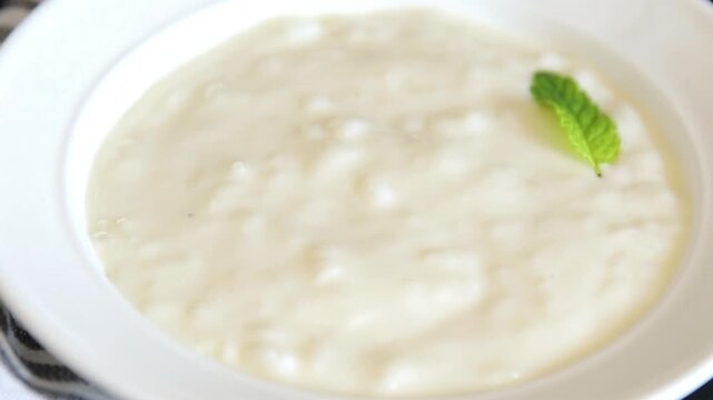 Sweet rice porridge healthy breakfast, vanilla dessert food preparation tasty snack fresh and delicious gourmet food background on the table rustic food top view copy space