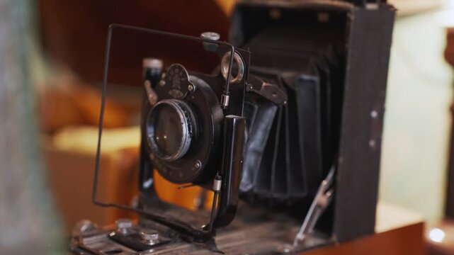 Close-up of an old vintage folding camera